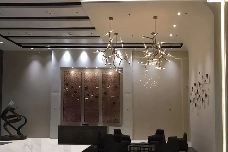 Reception lounge with feature lighting at 247 Park